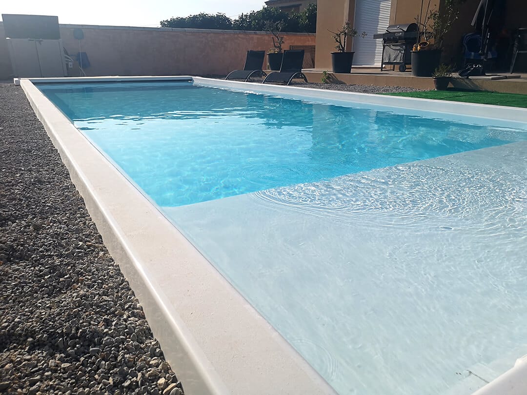 piscina con playa malibu de freedom Pools